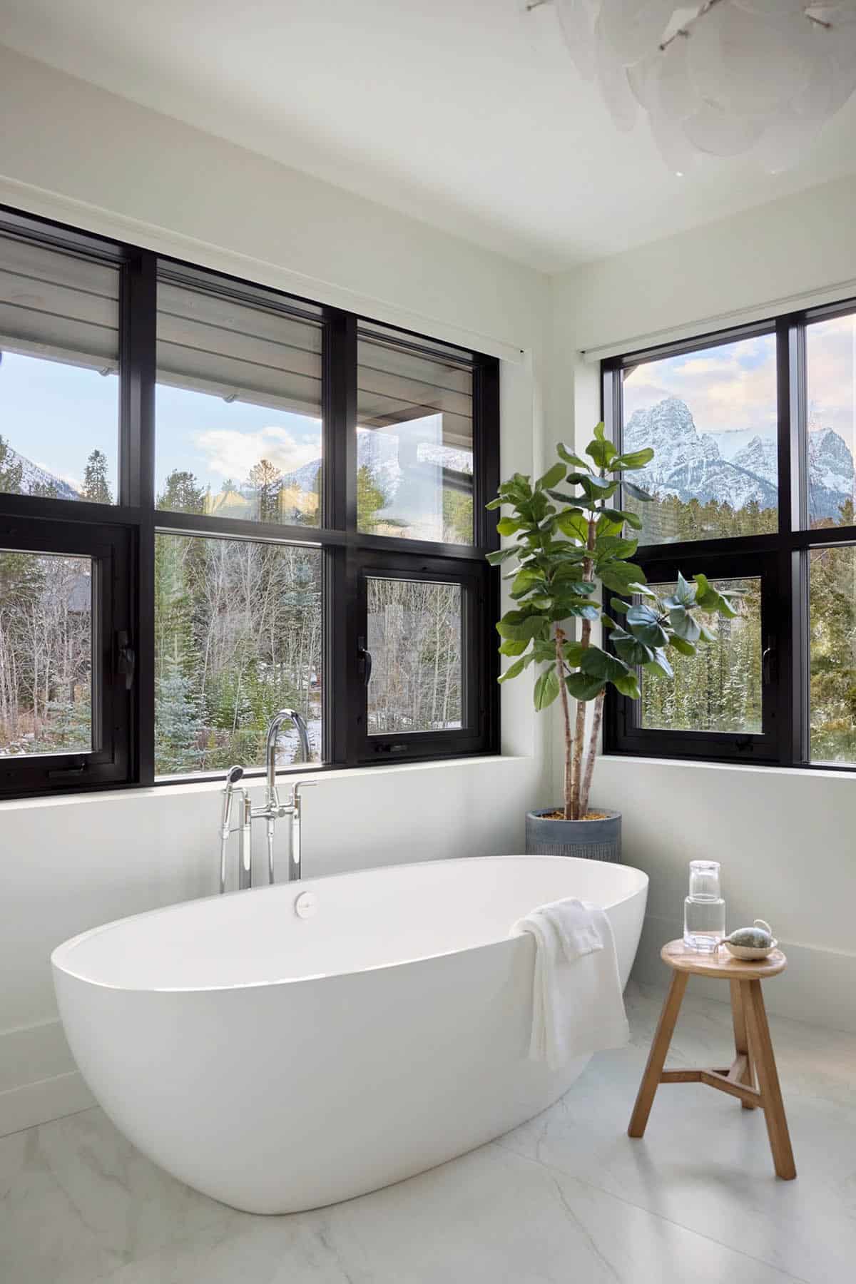 modern mountain style bathroom with a freestanding tub
