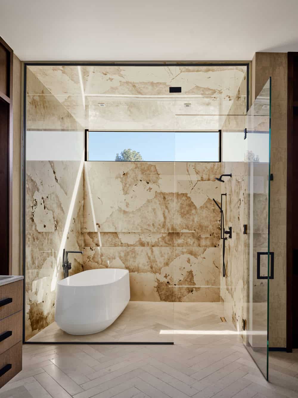  modern bathroom with a freestanding tub in the shower