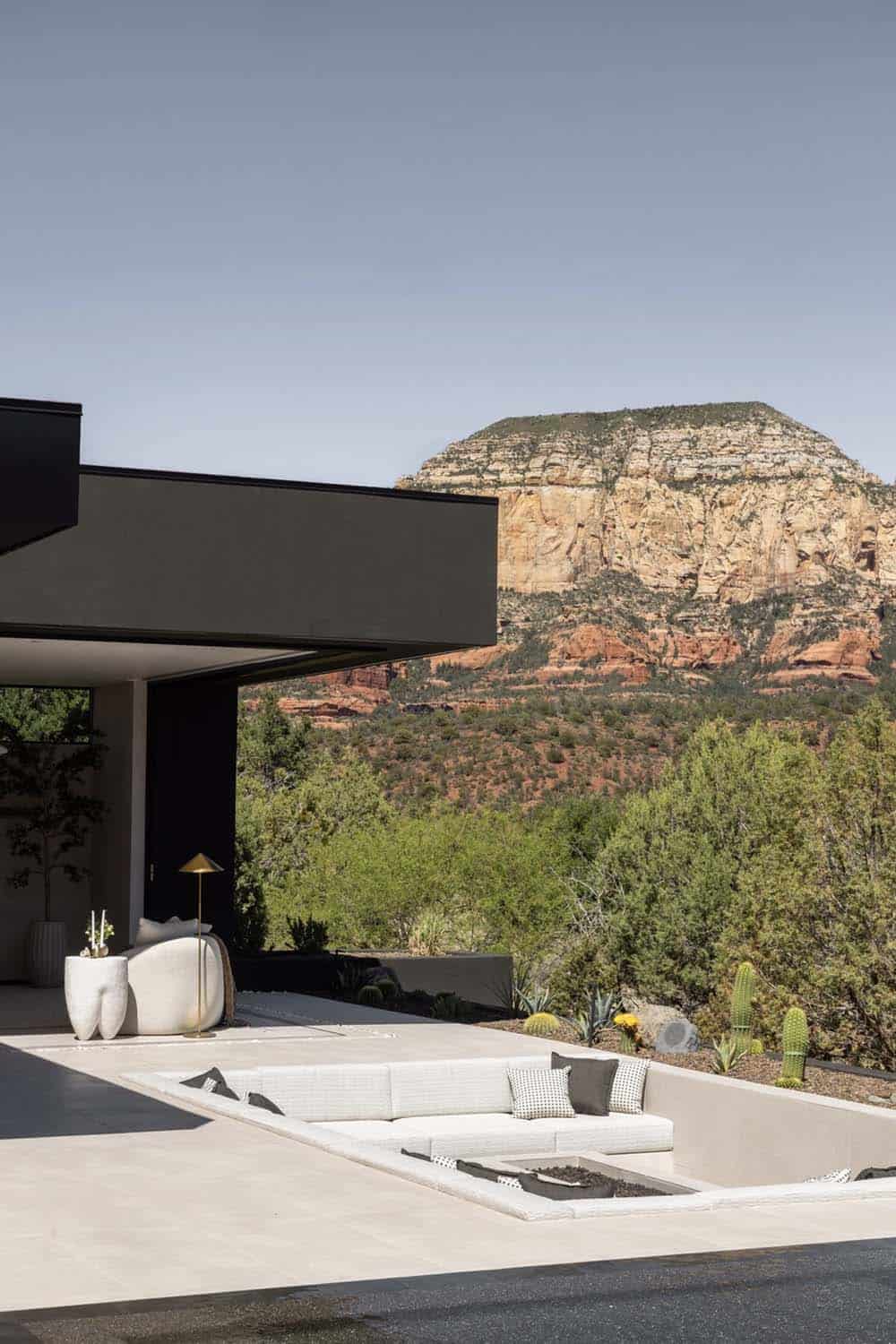 modern mountain home exterior with a patio