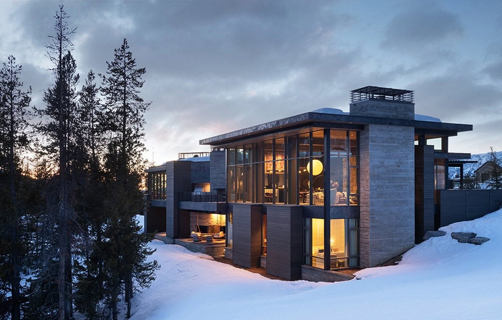 mountain home exterior with snow