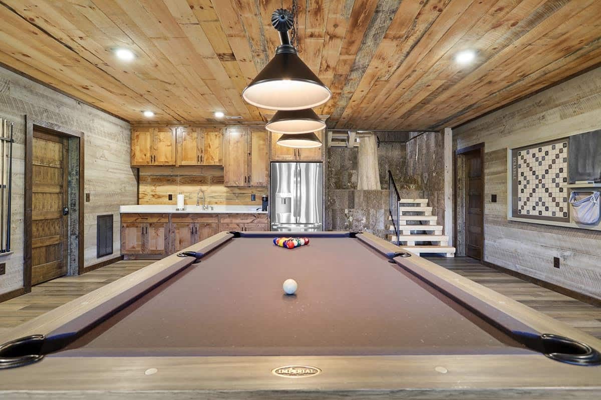 modern rustic lower-level game room 