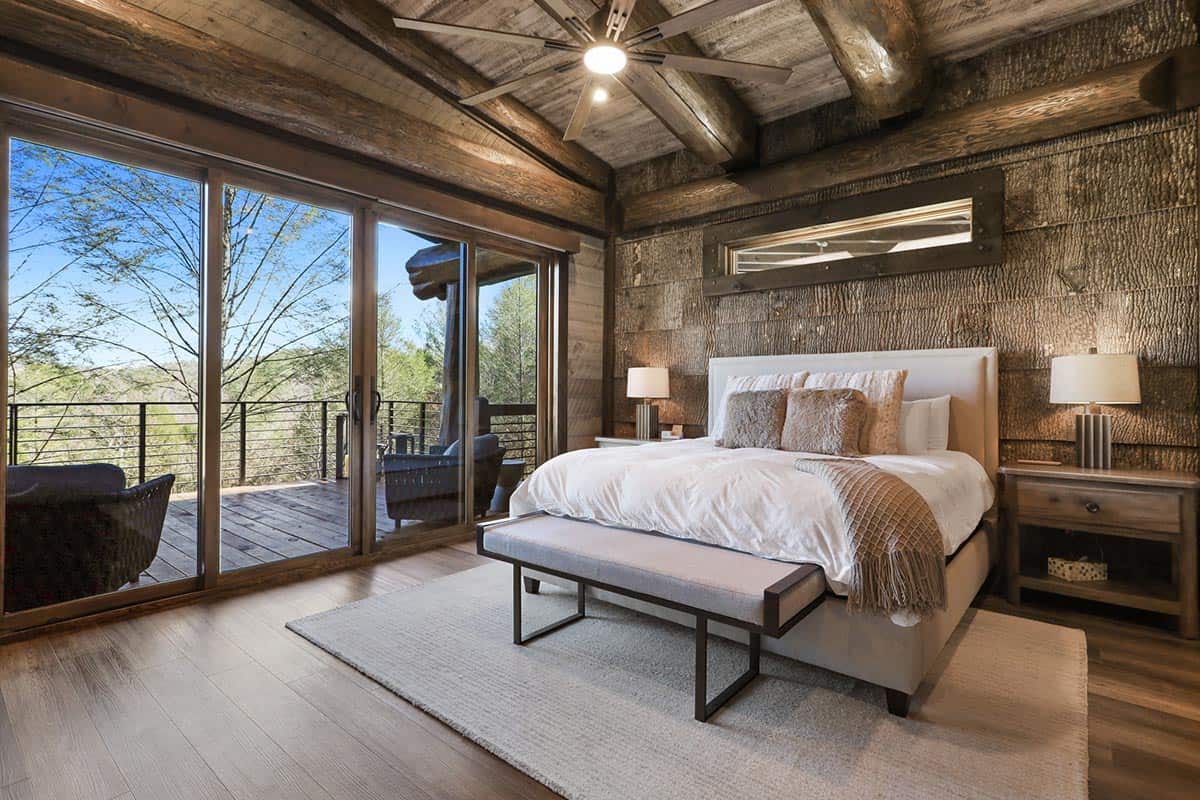 modern rustic bedroom with sliding glass doors