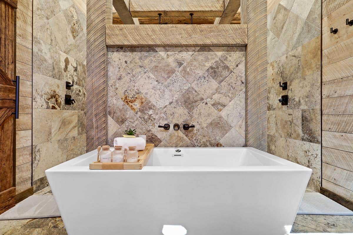 modern rustic bathroom with a soaking tub