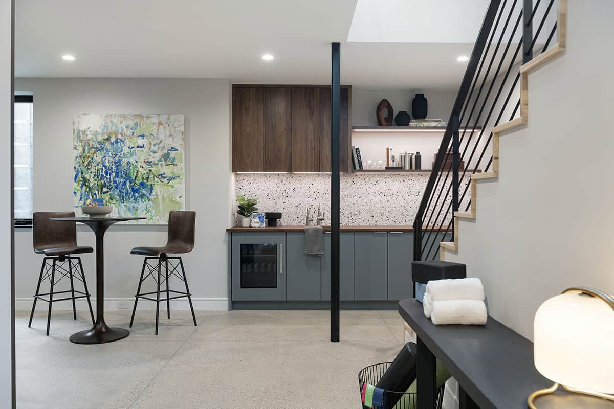 modern basement level with a home bar