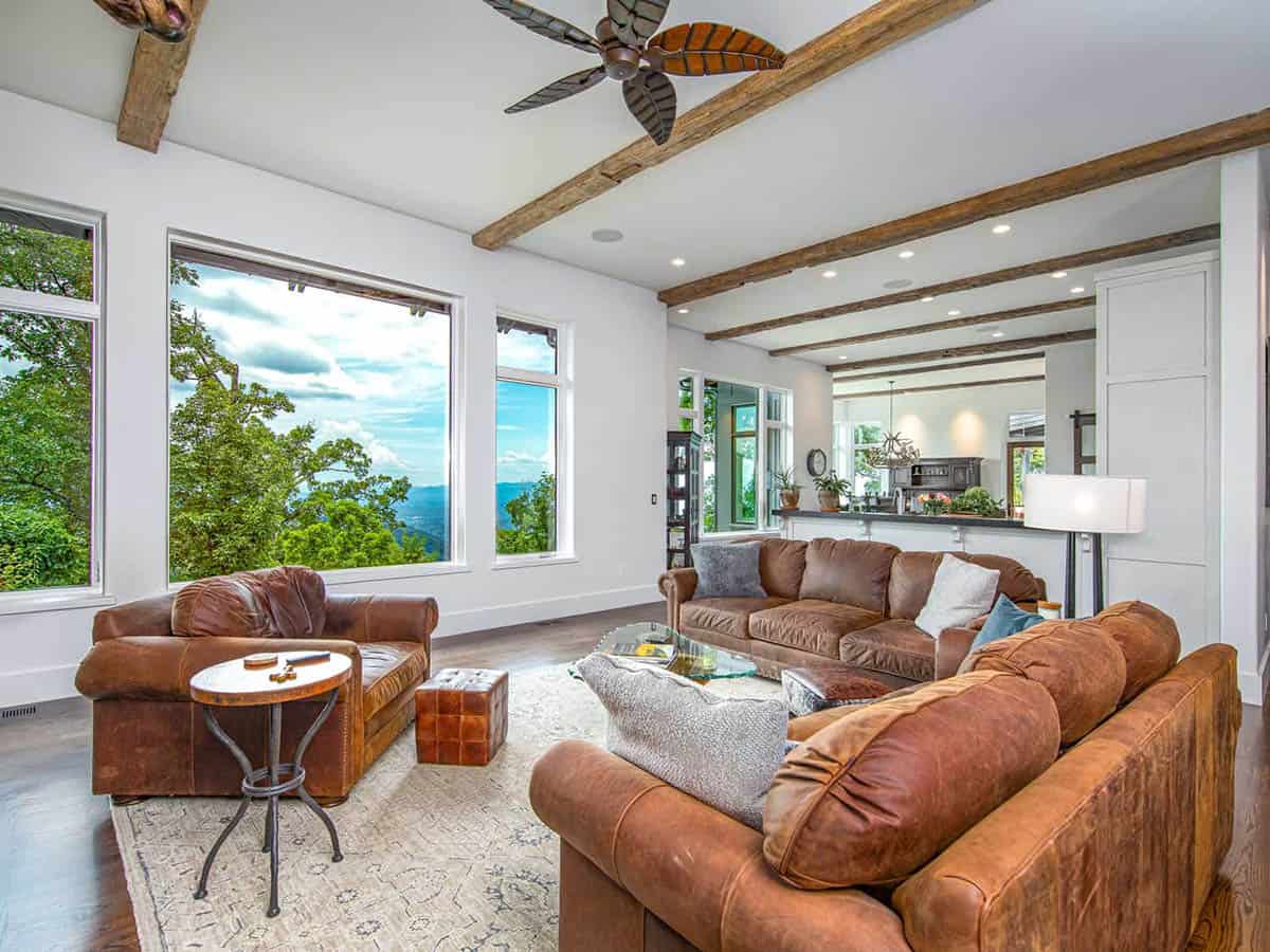 mountain ranch style living room with a large window