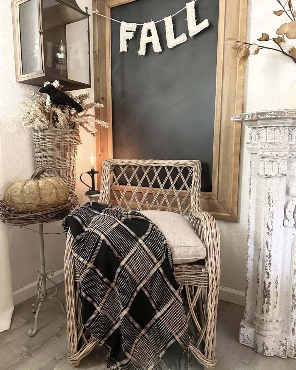 chair with a plaid throw decorated for fall