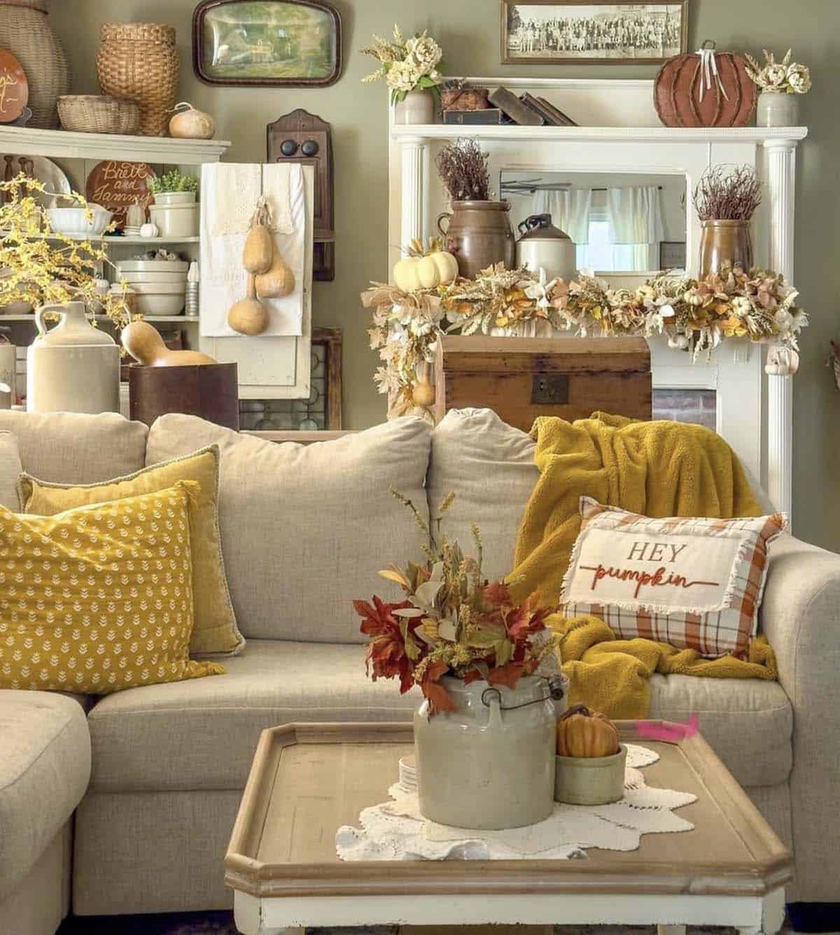 living room decorated for fall with musturd yellow accents