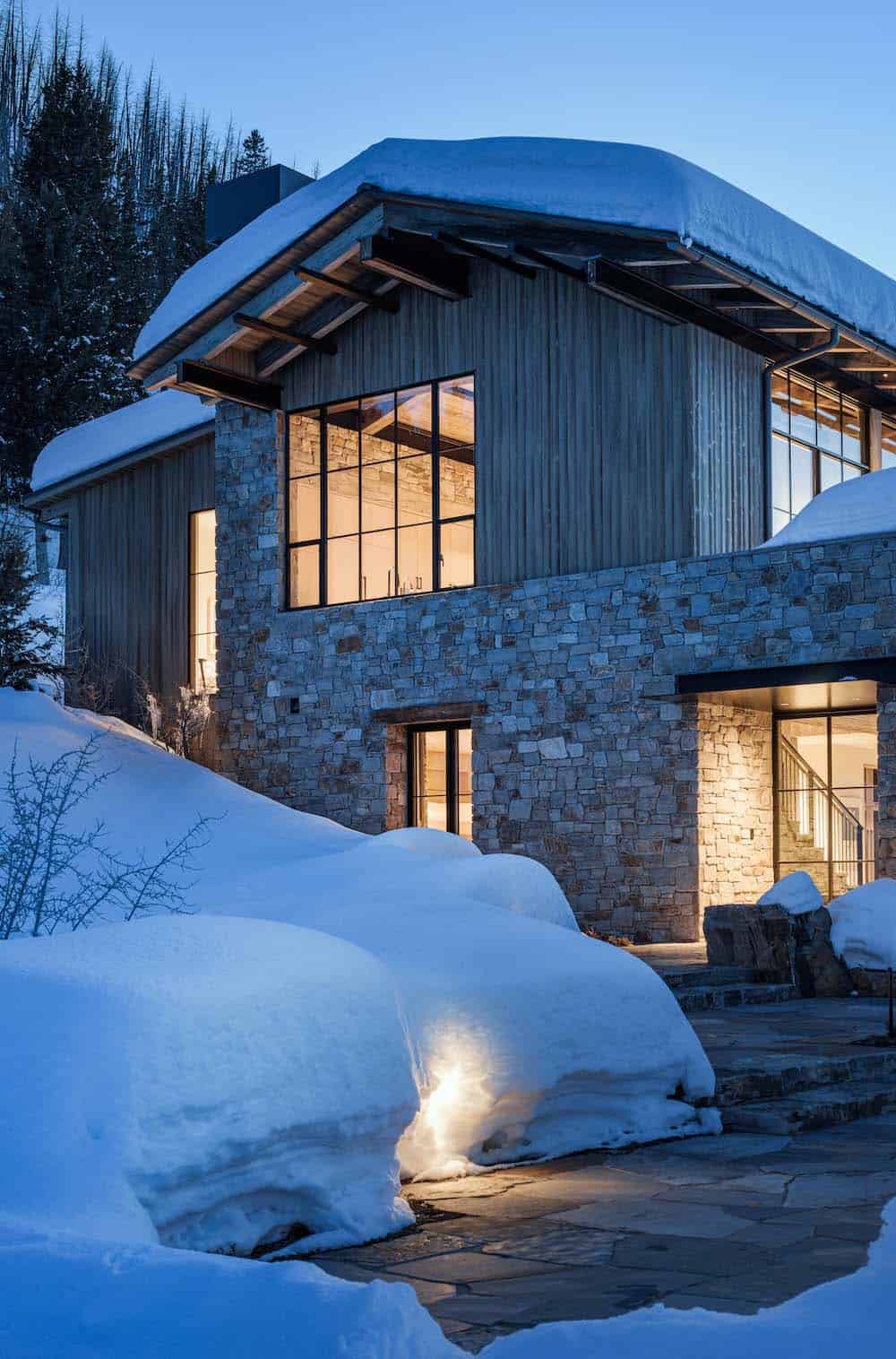 mountain home exterior with snow