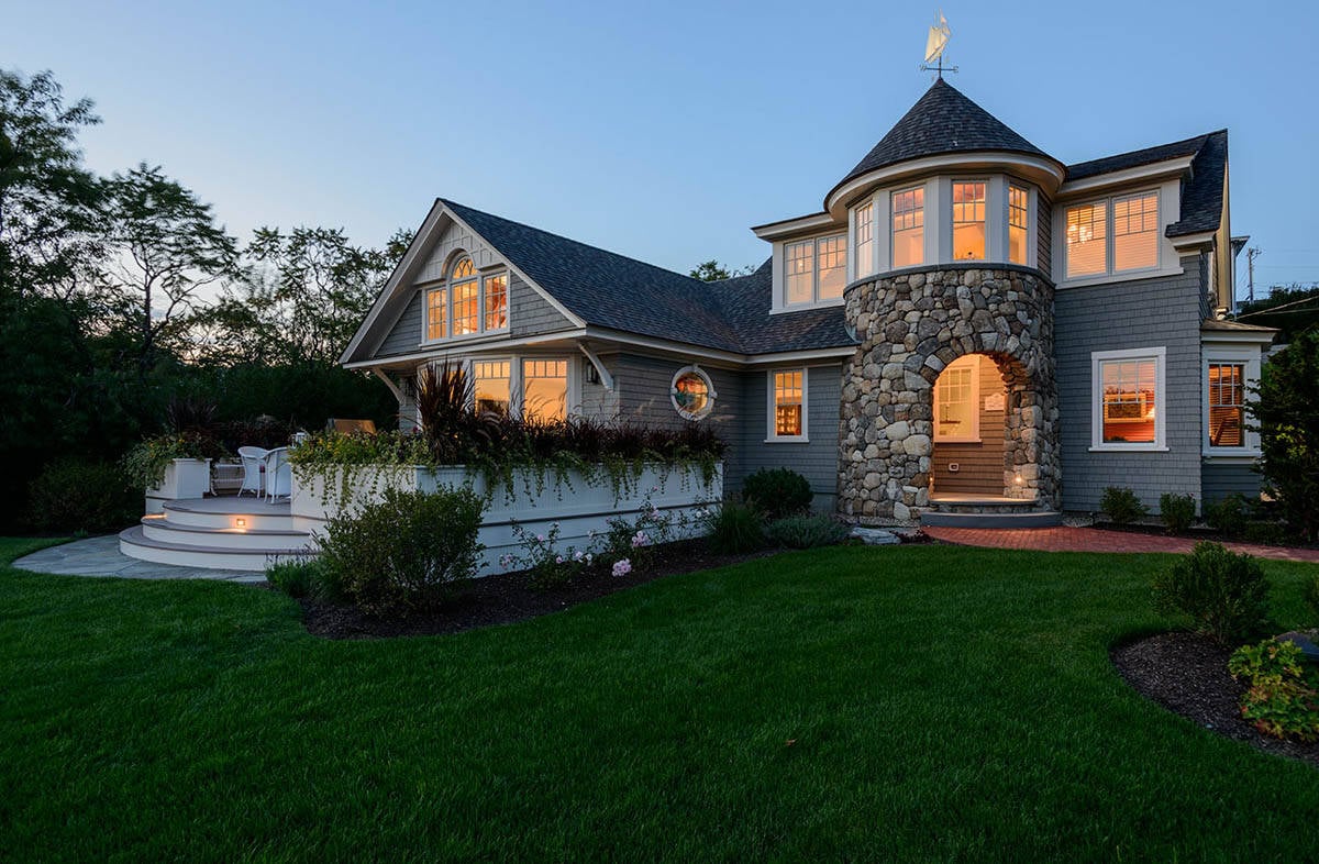 seaside cottage retreat exterior at dusk