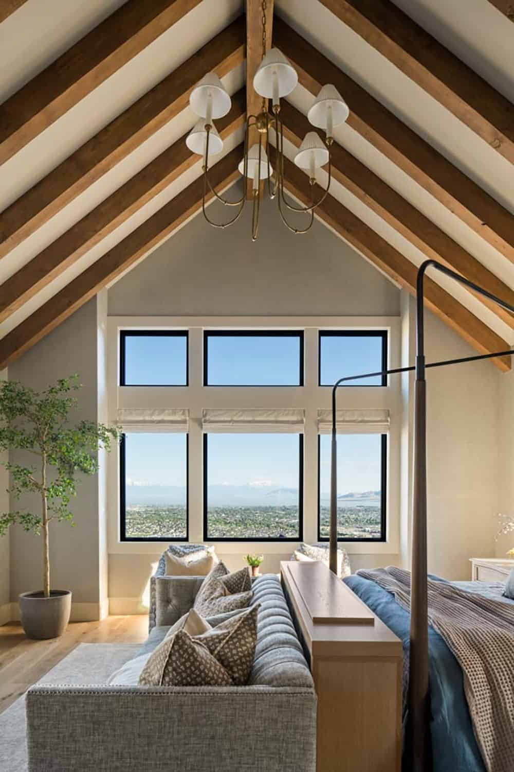 contemporary bedroom with a vaulted ceiling