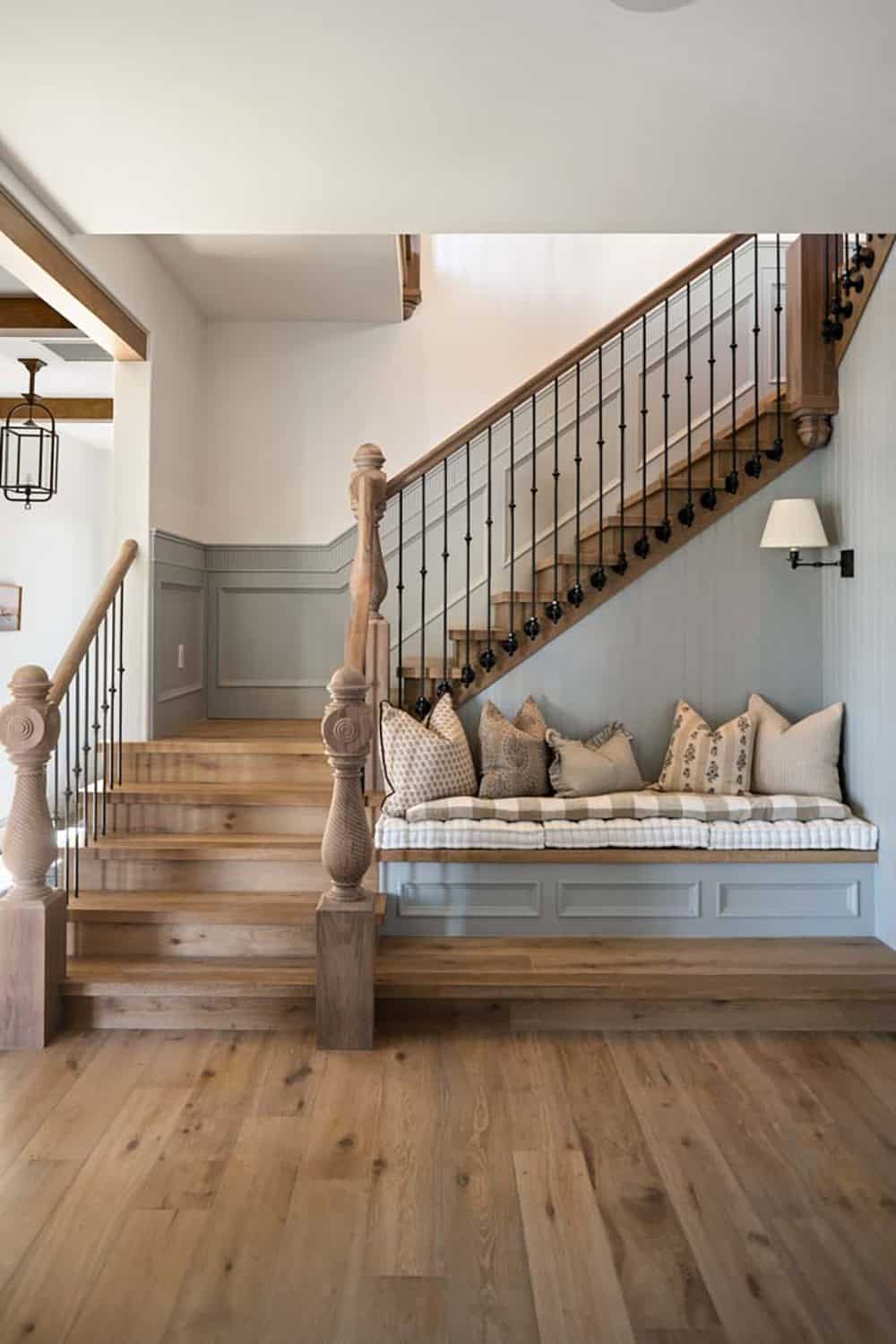 contemporary staircase with a built-in reading nook