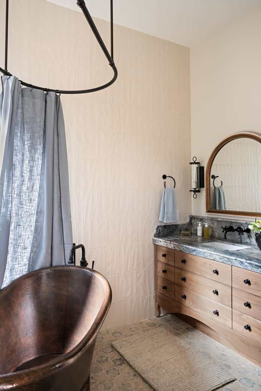 contemporary bathroom with a copper tub