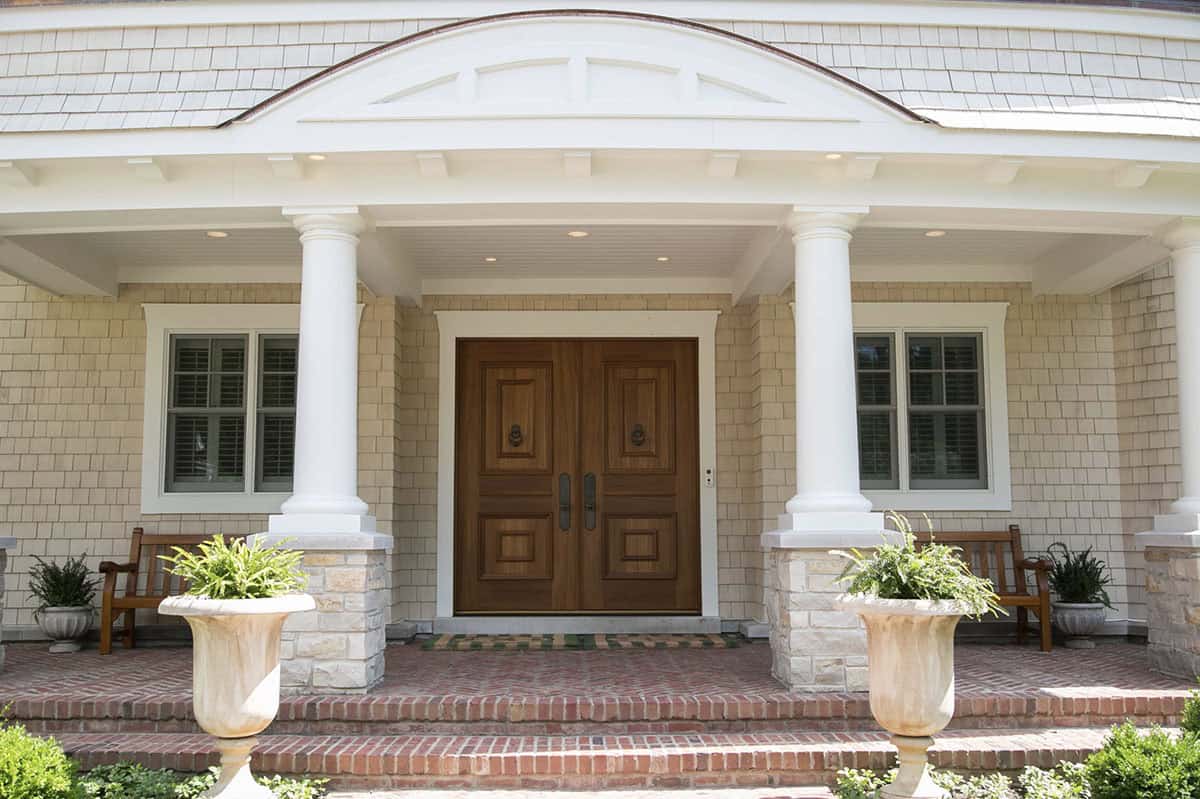 traditional style lake house exterior entry