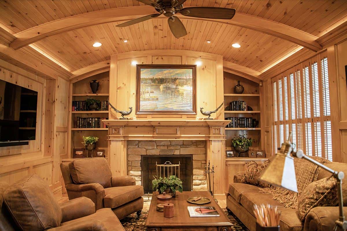 traditional style family room with a fireplace