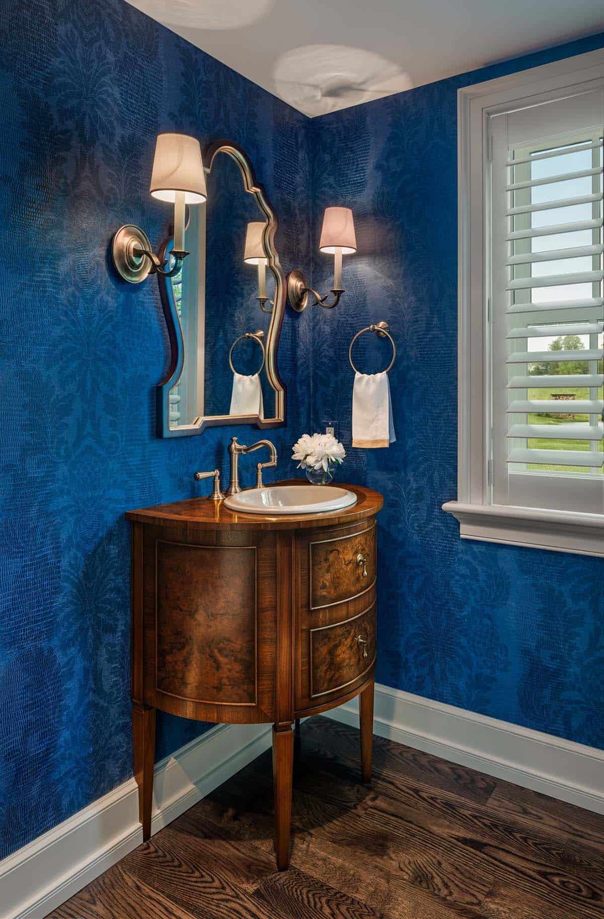 traditional powder room with blue walls