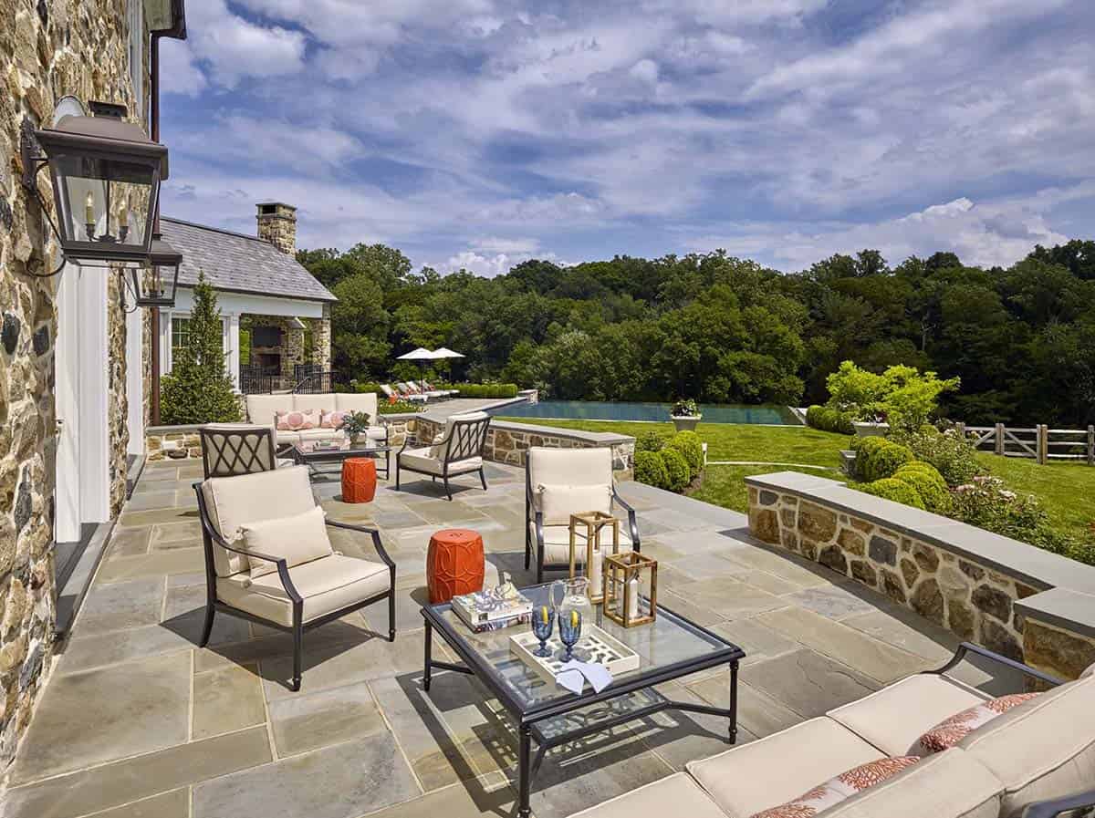traditional home exterior with a pool