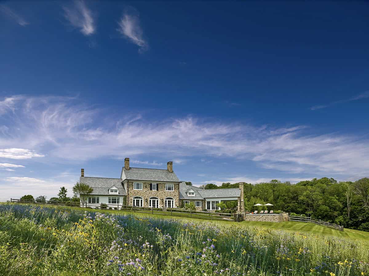 traditional home exterior with landscape