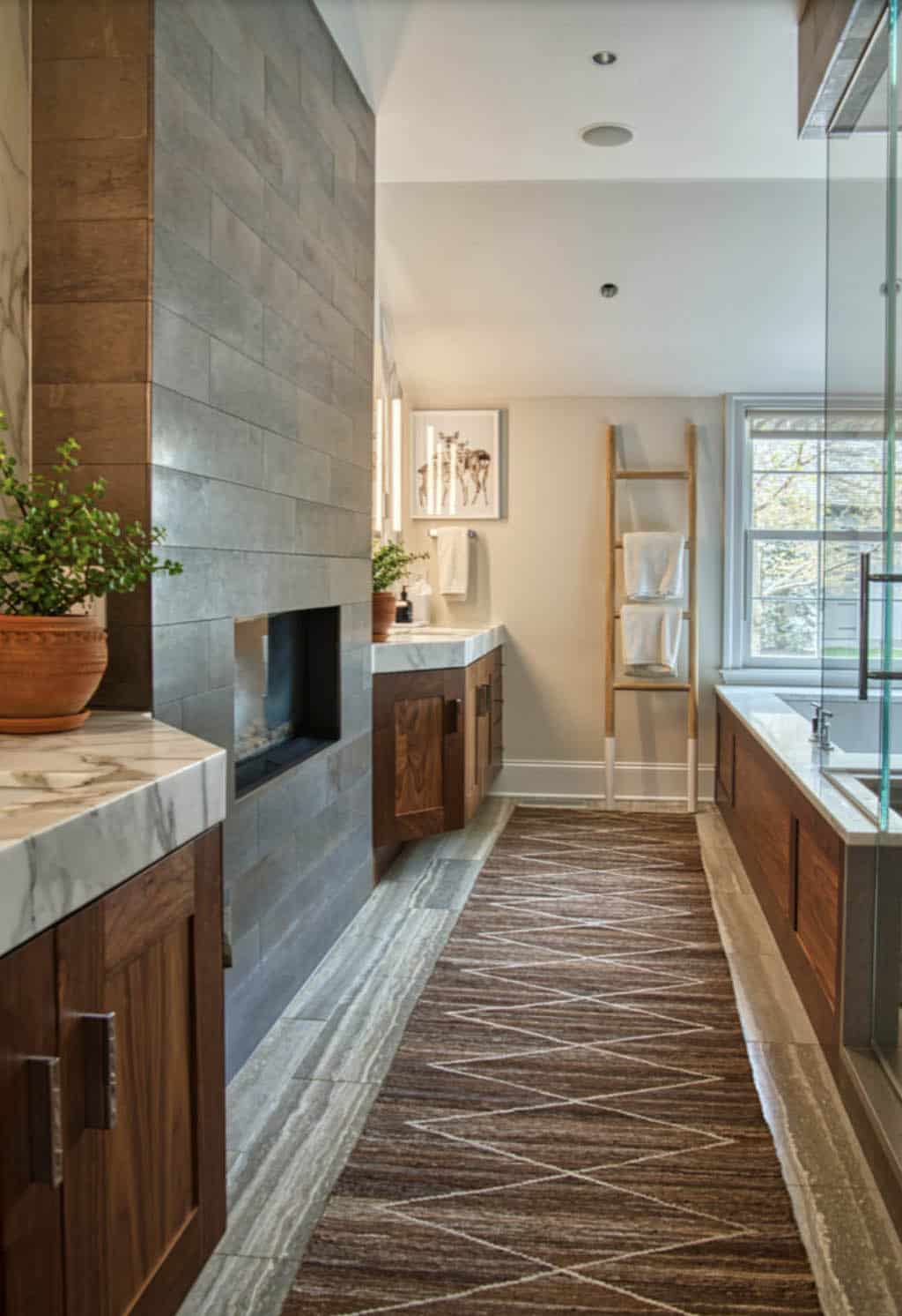 transitional style bathroom with a fireplace