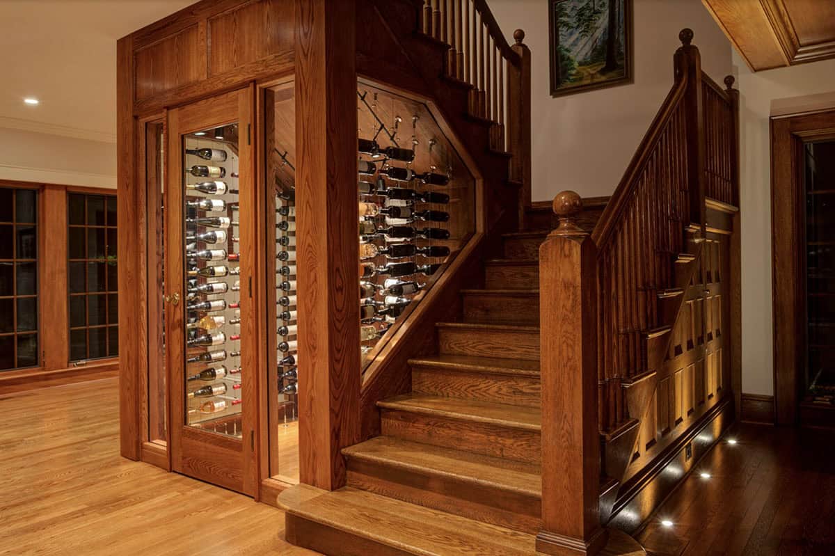 traditional staircase with a wine cellar