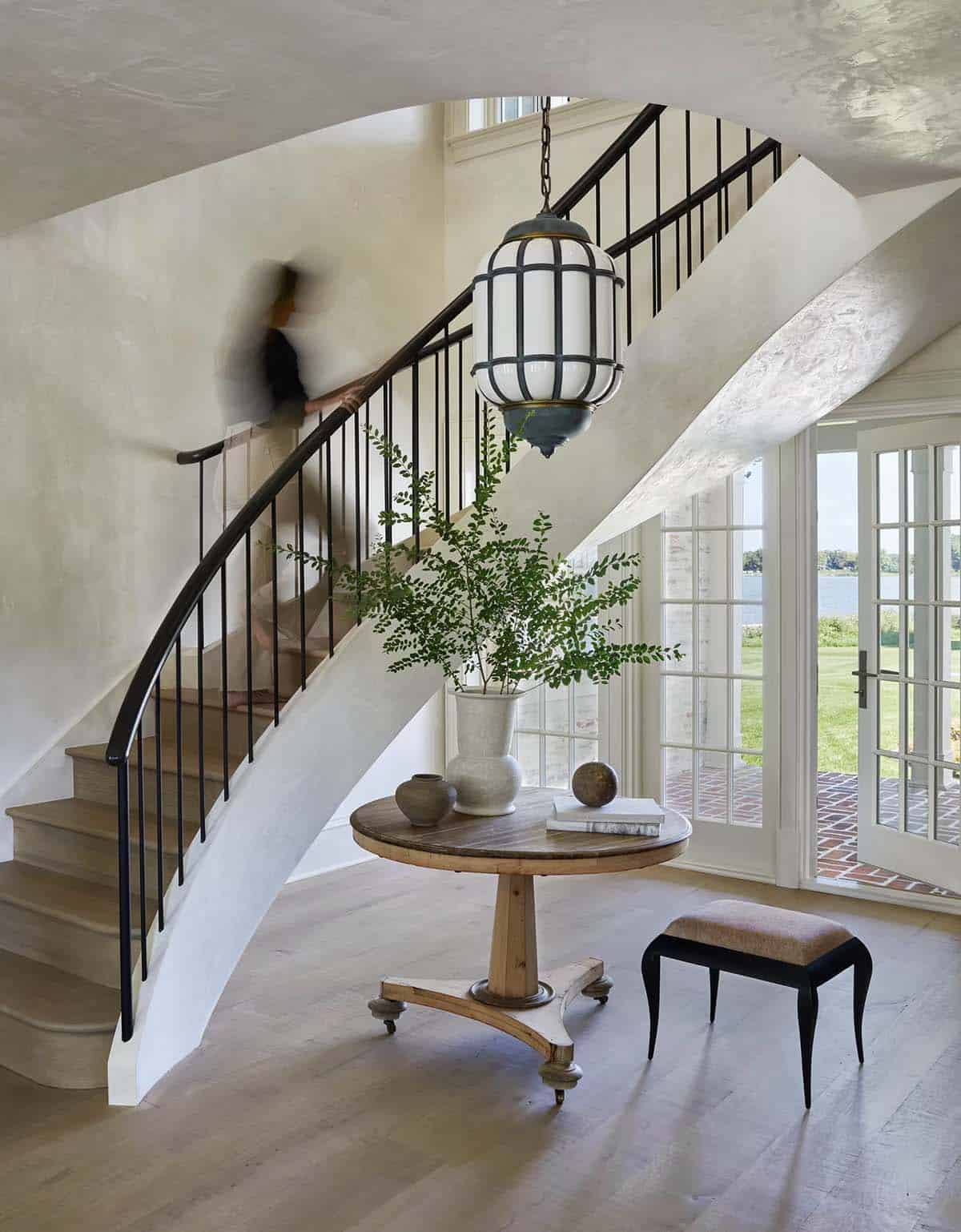 waterfront home entry with a staircase