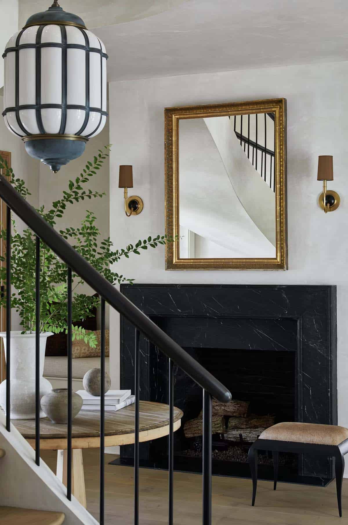 waterfront home entry with a fireplace