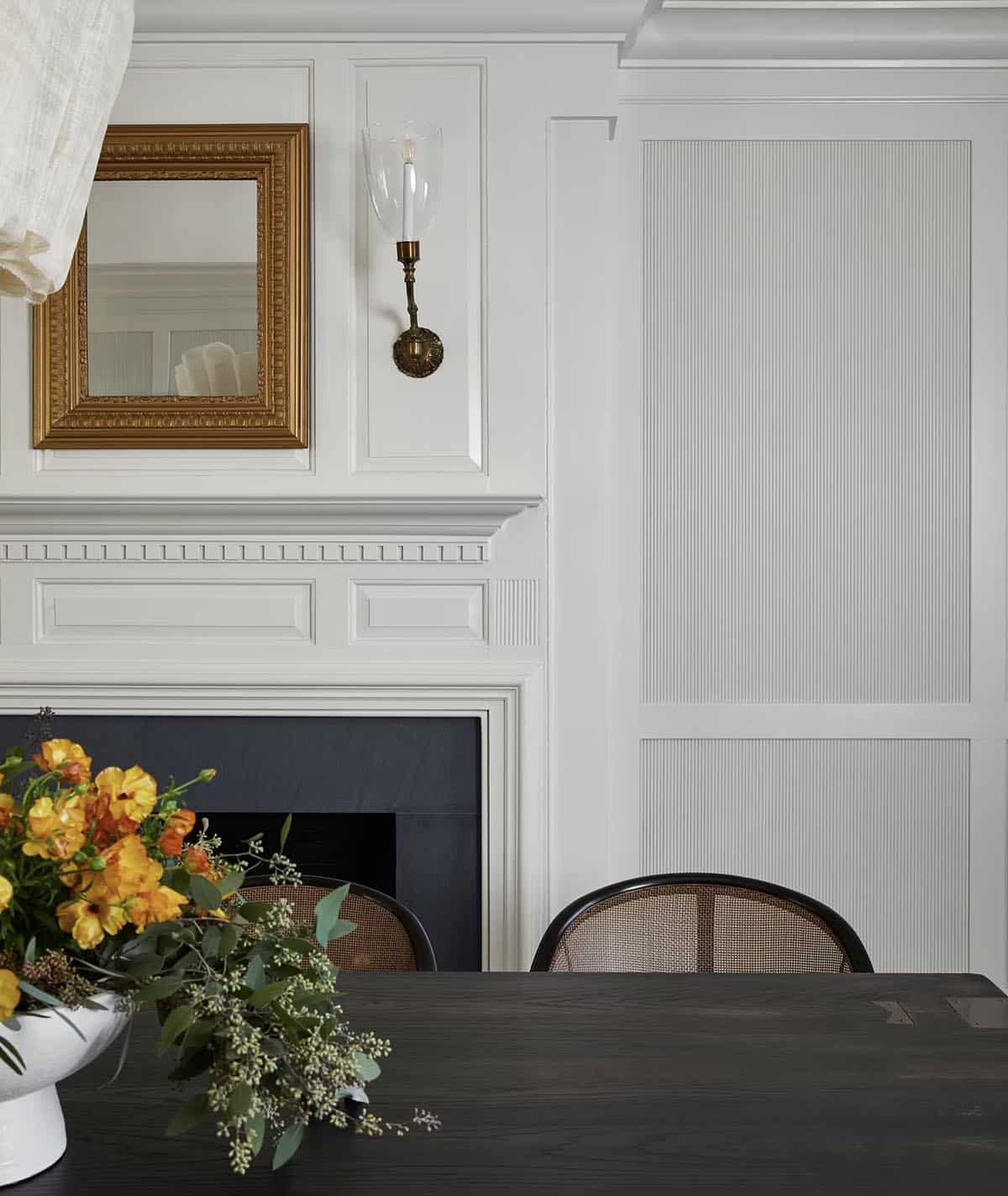contemporary dining room with a fireplace