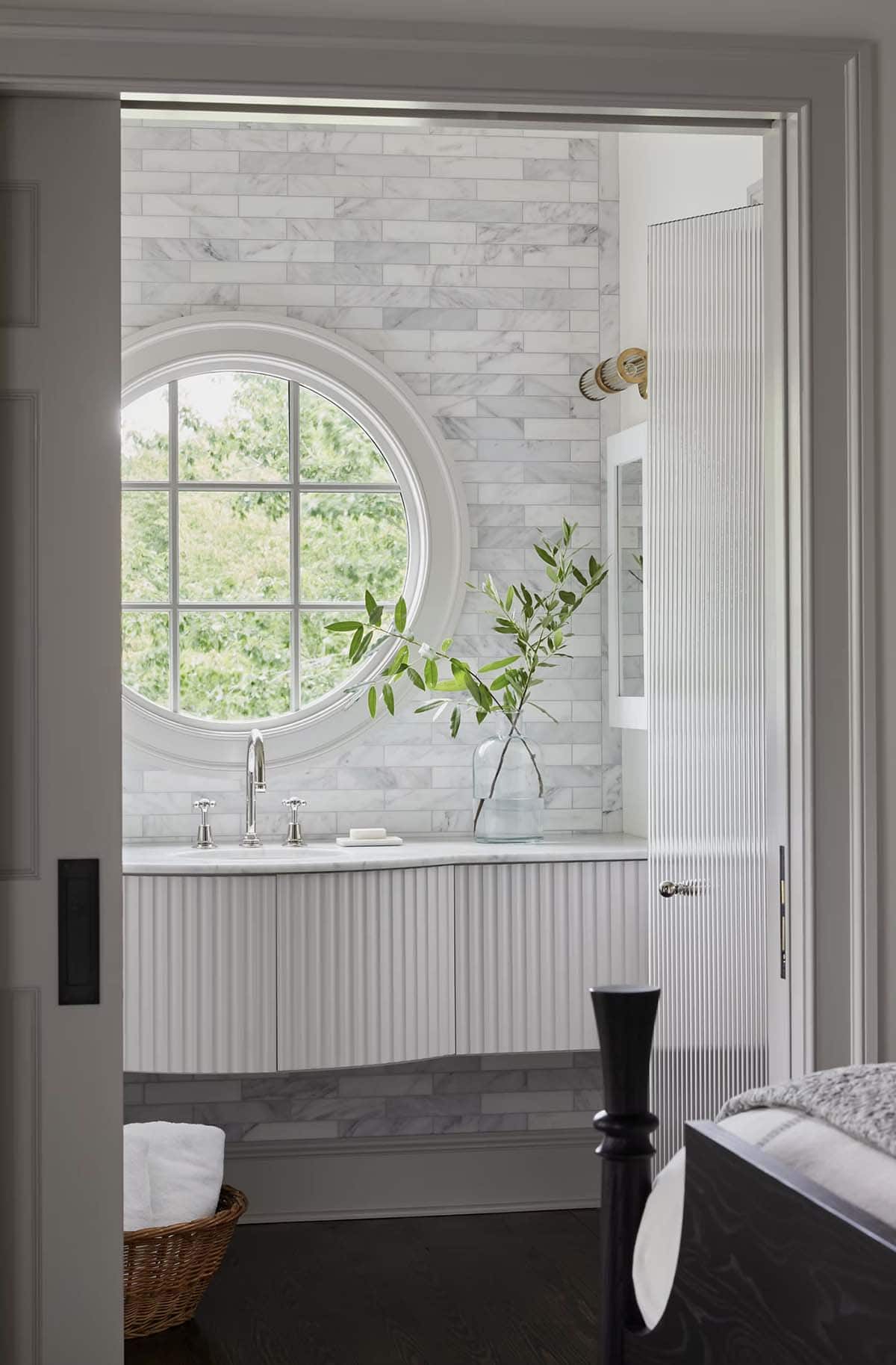 contemporary bathroom with a round window