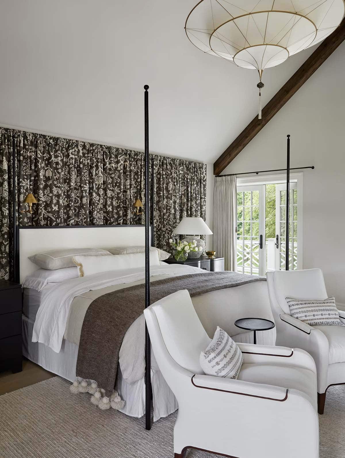 contemporary bedroom with a four poster bed