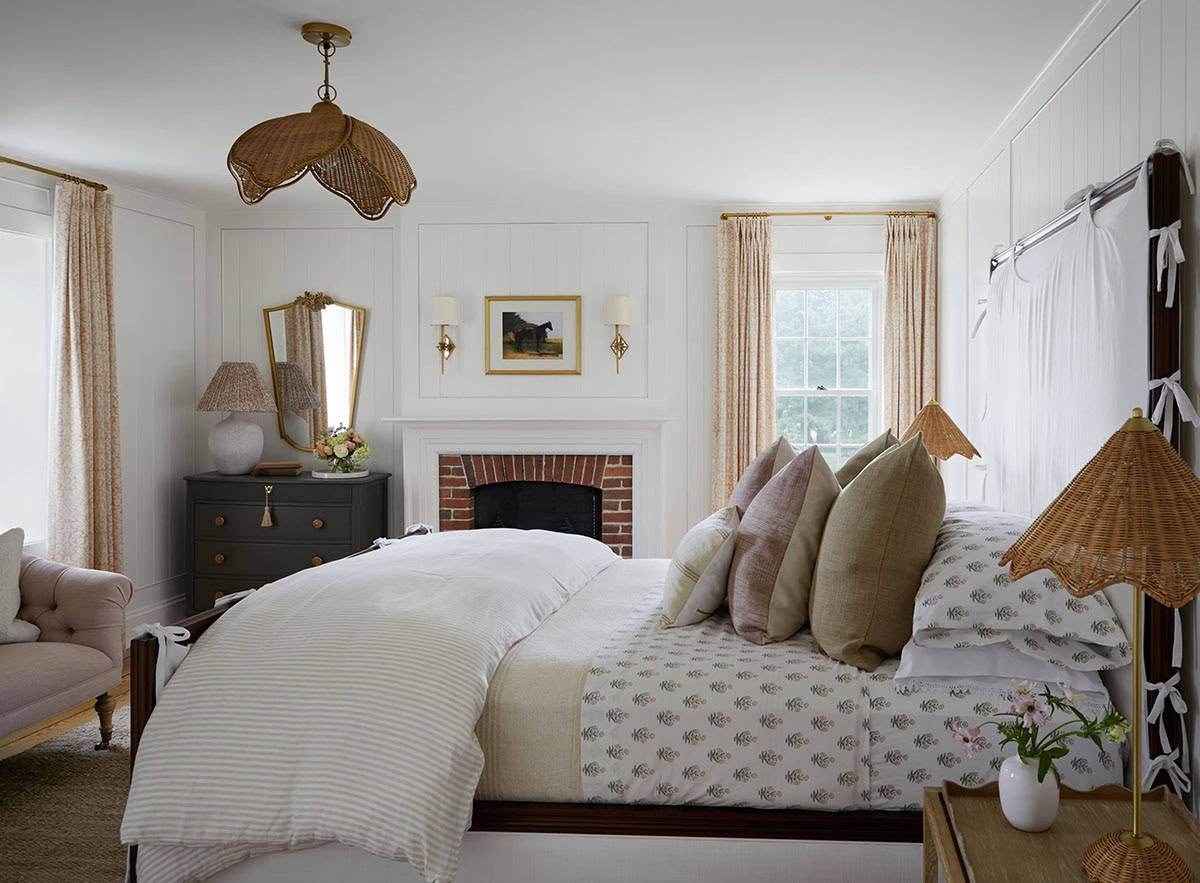 contemporary bedroom with a fireplace