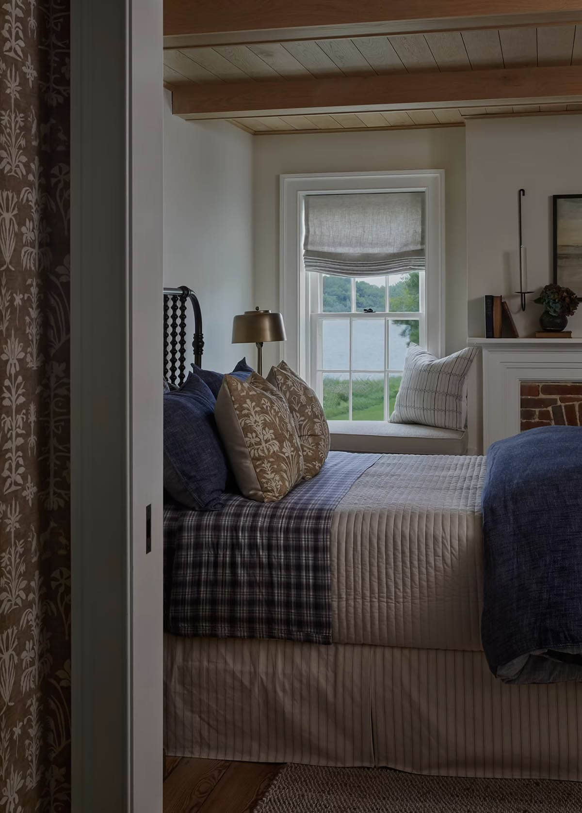 contemporary bedroom with a fireplace