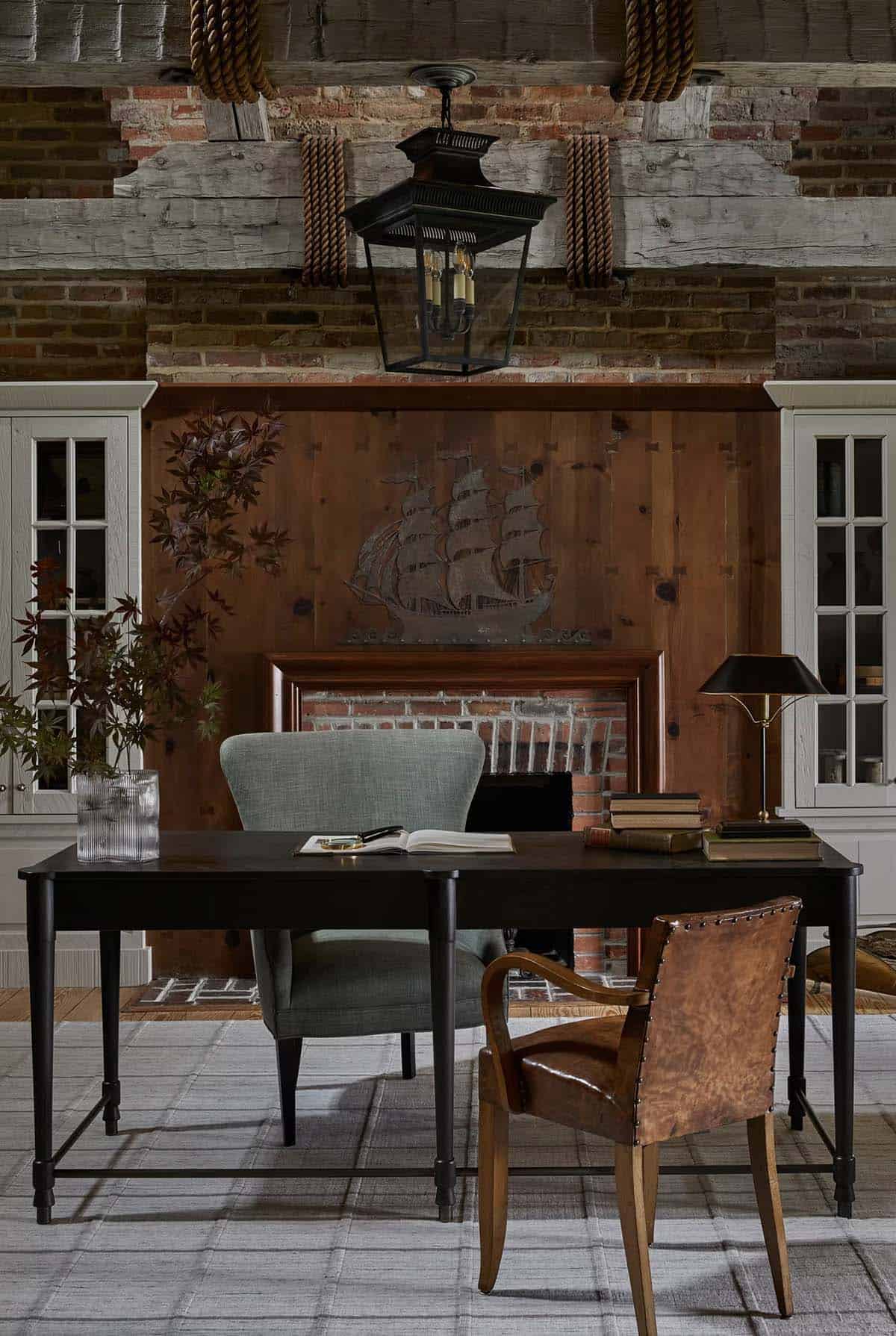 contemporary home office with a fireplace