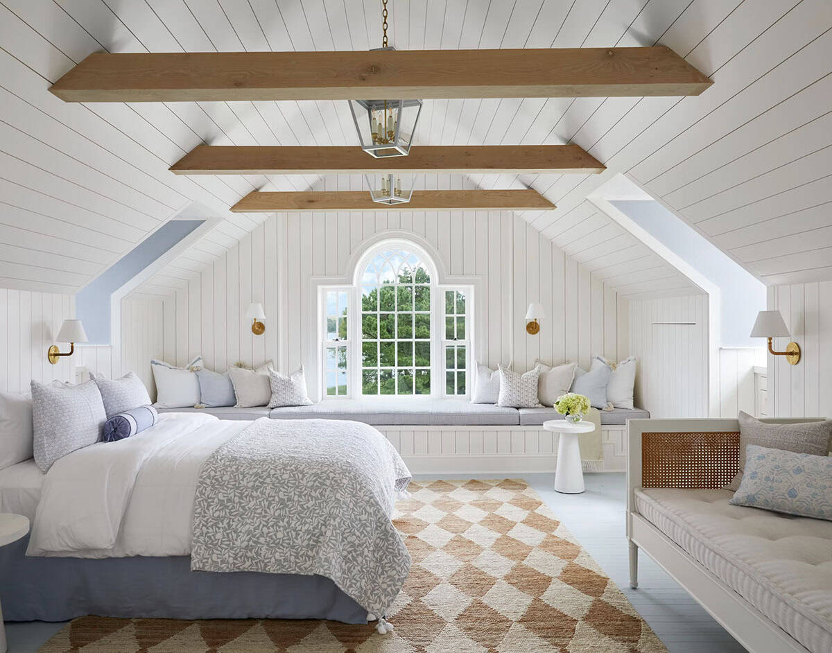 contemporary guest bedroom with wood beams