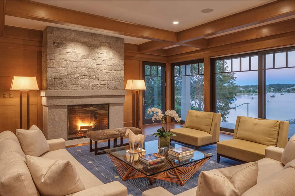 beach style sunroom with a fireplace