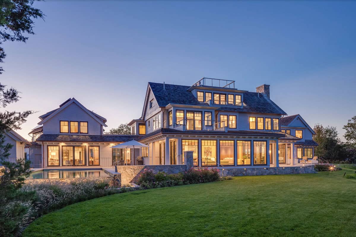 beach style house exterior at dusk