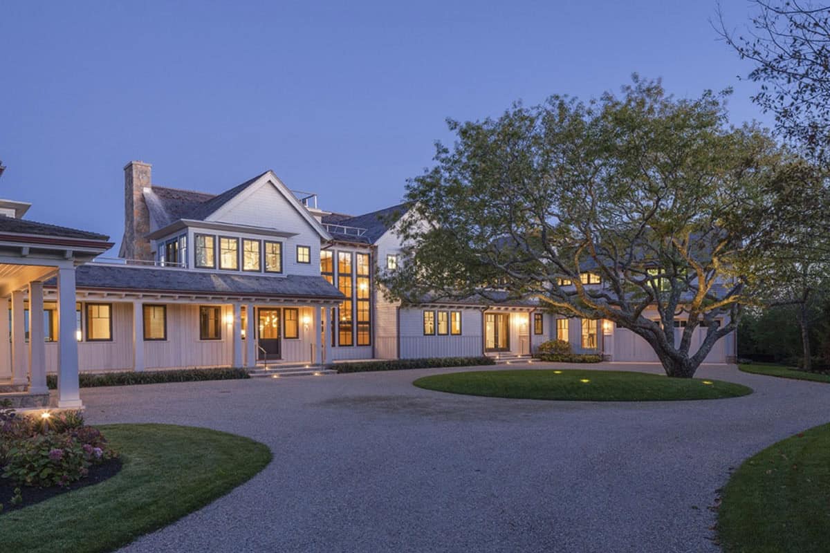 beach style house exterior at dusk