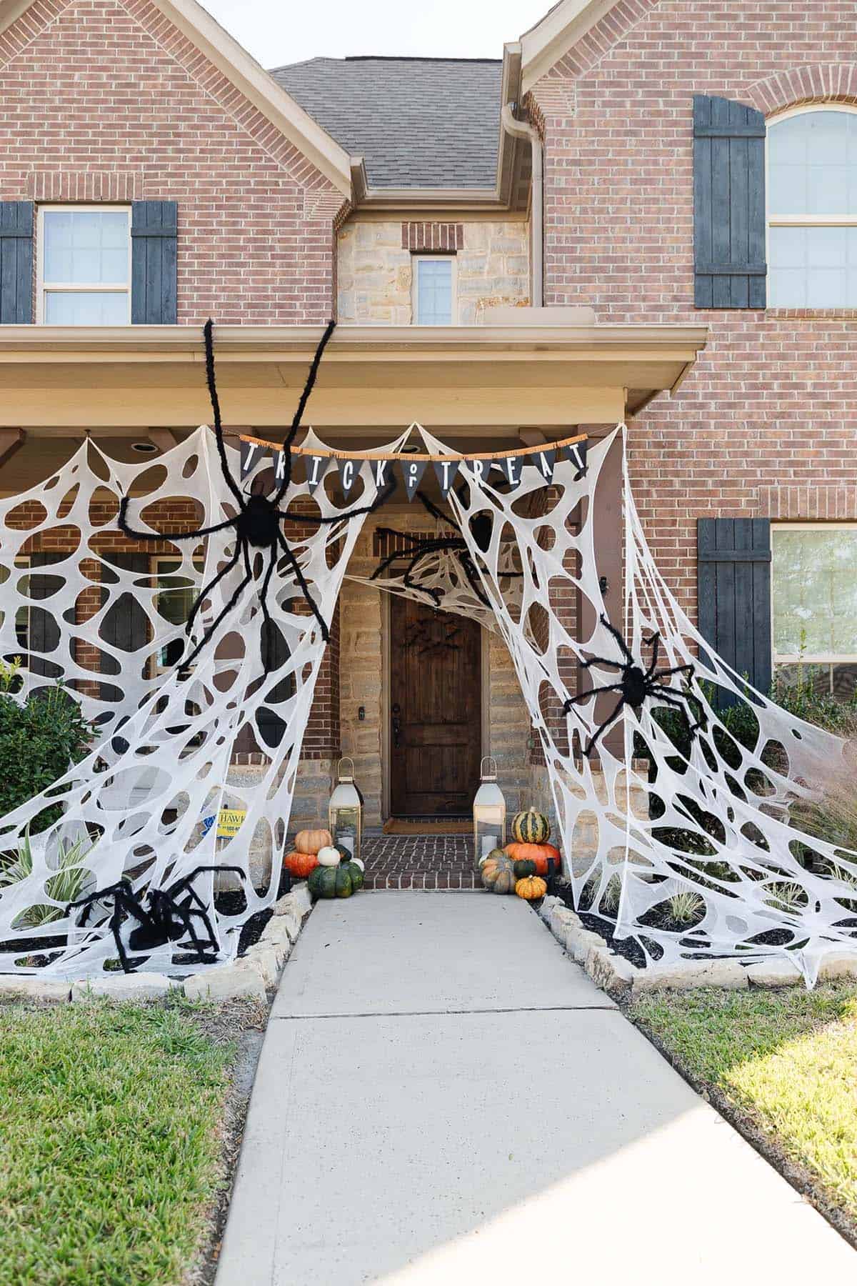 halloween yard decor with a DIY spider web