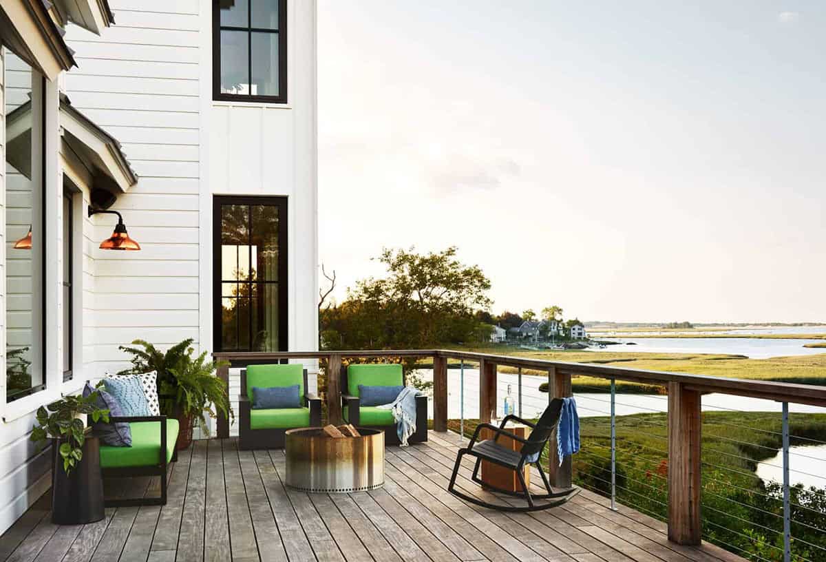 coastal modern farmhouse exterior backyard view with a deck