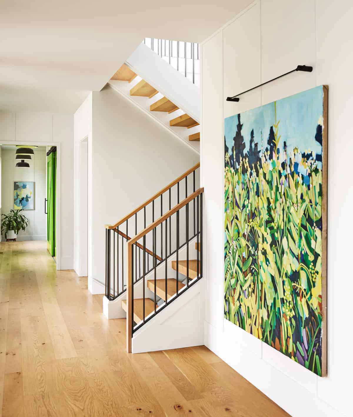 coastal modern farmhouse entry with a staircase
