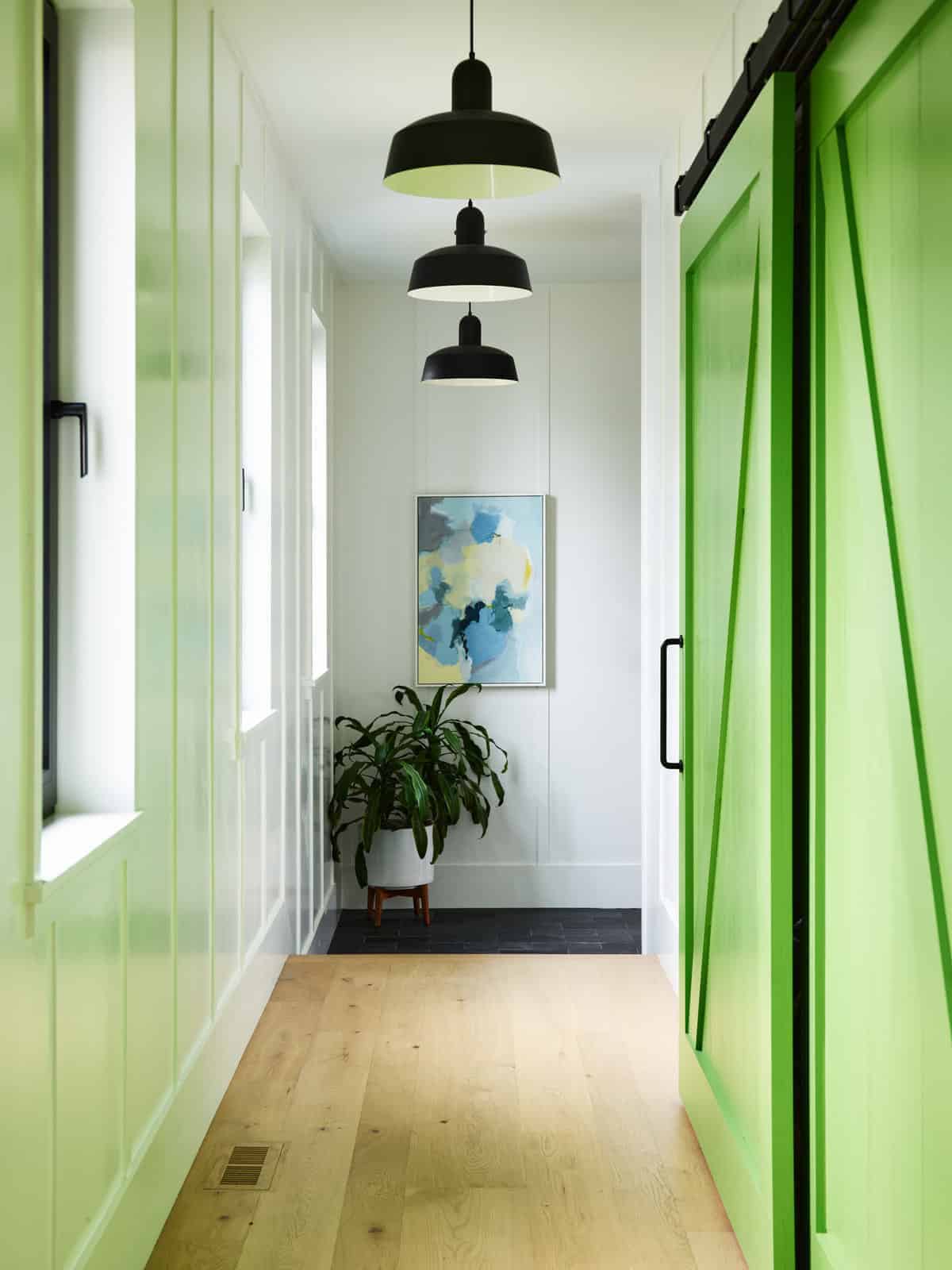 coastal modern farmhouse hallway with a sliding barn door