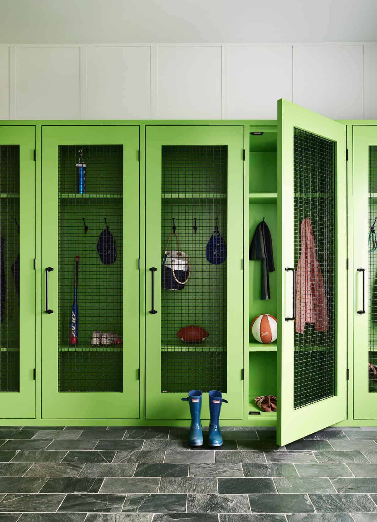 coastal modern farmhouse mudroom with green cabinets