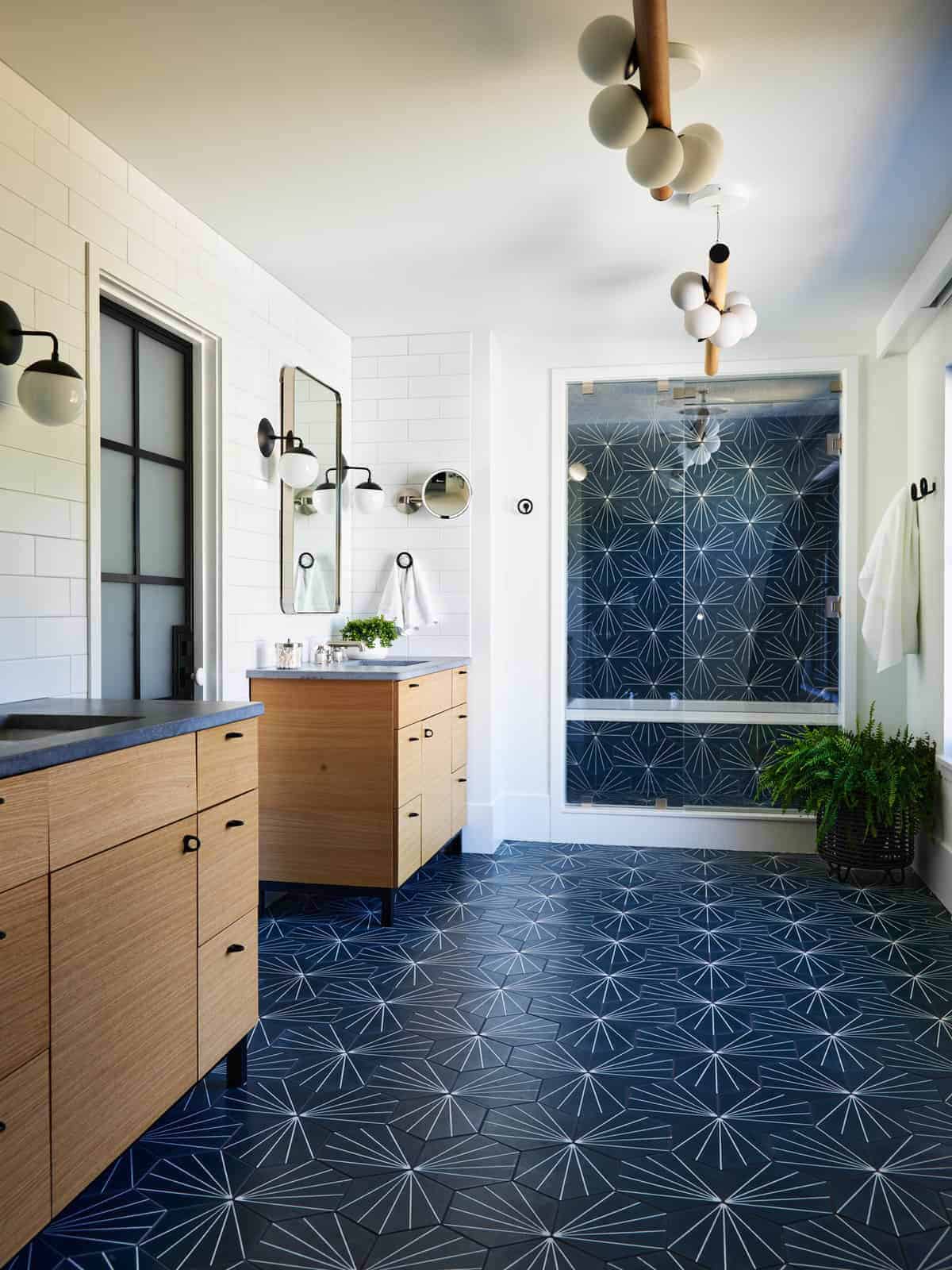 coastal modern farmhouse bathroom with dual vanities