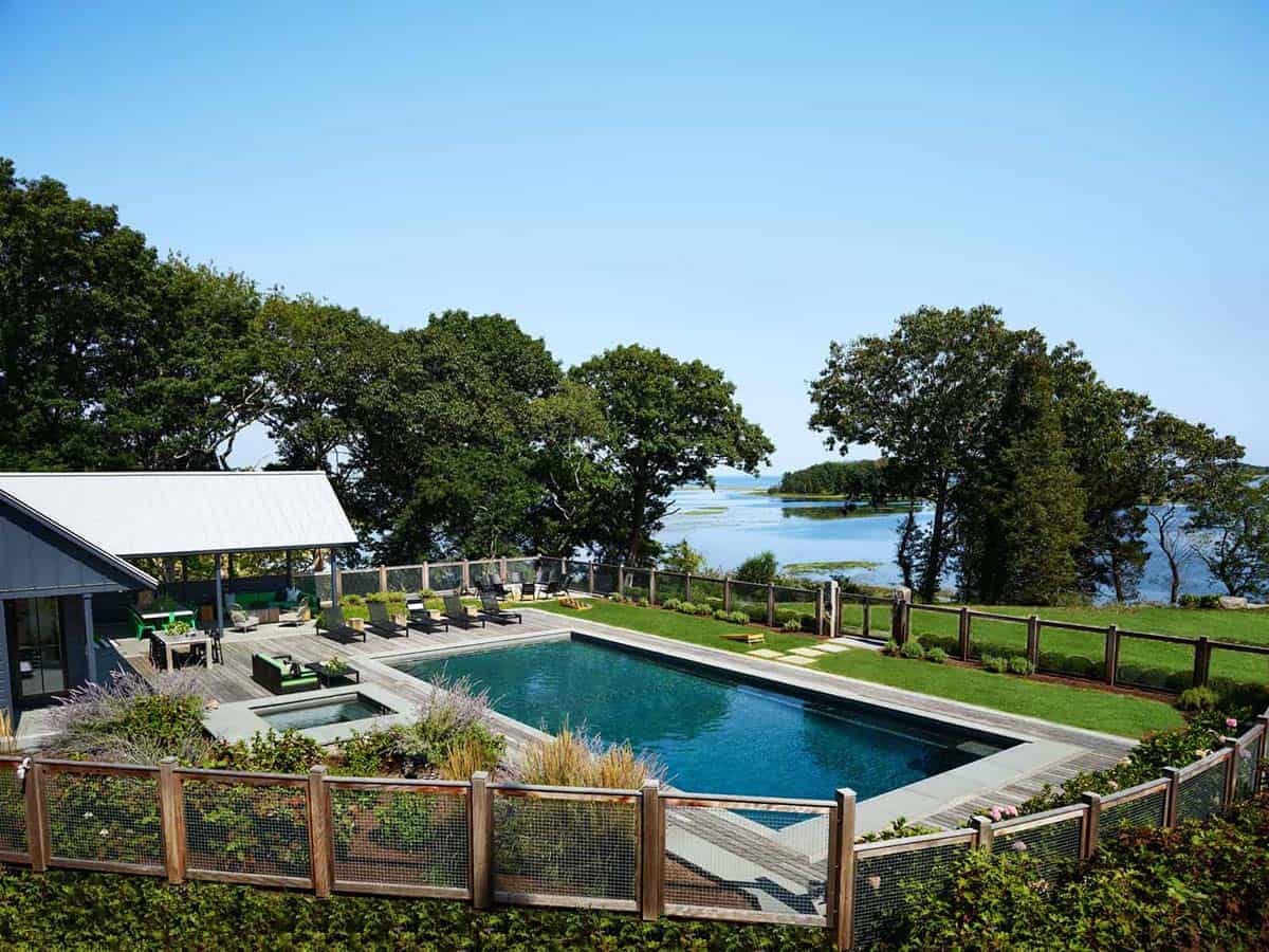 coastal modern farmhouse with a pool