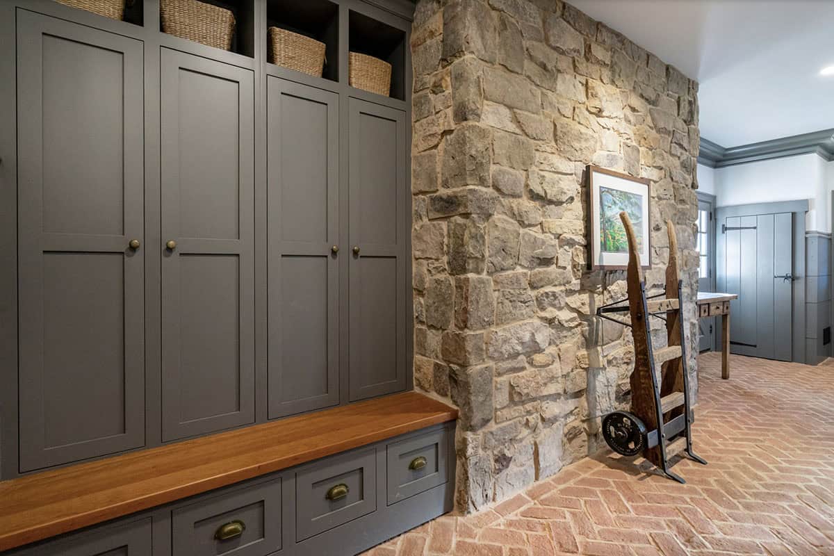 farmhouse style mudroom with a built-in bench