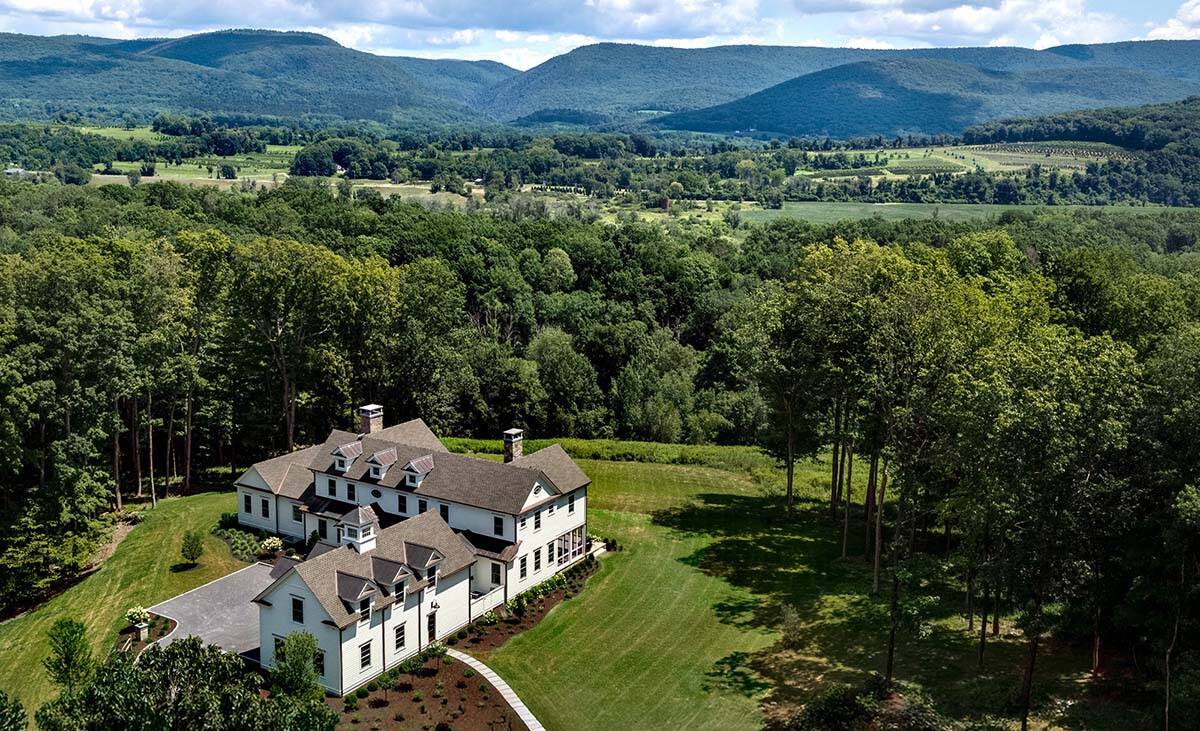 traditional style home exterior aerial view