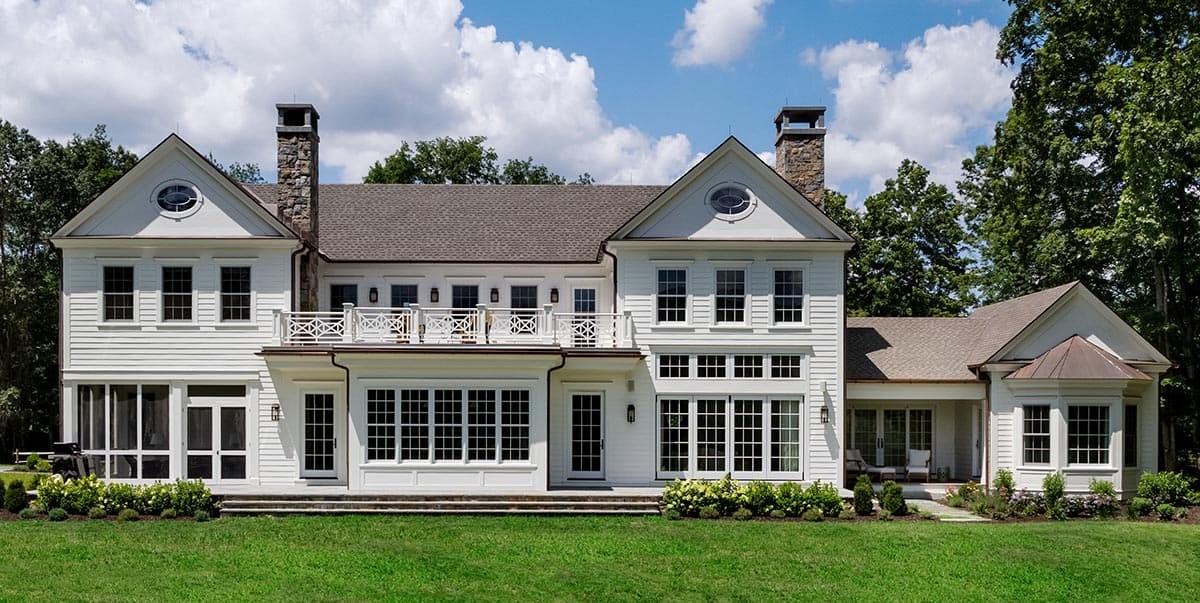 traditional style home exterior backyard view