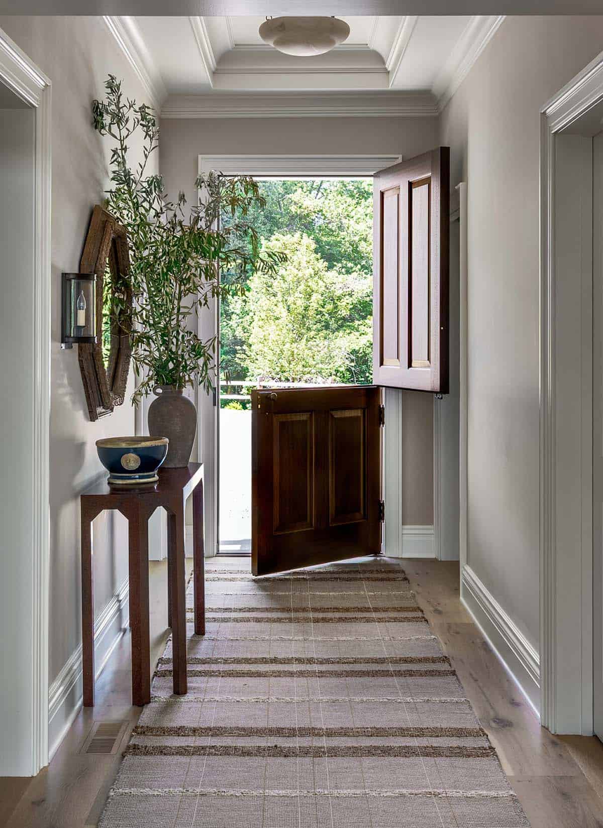 traditional style country house entry with a dutch door