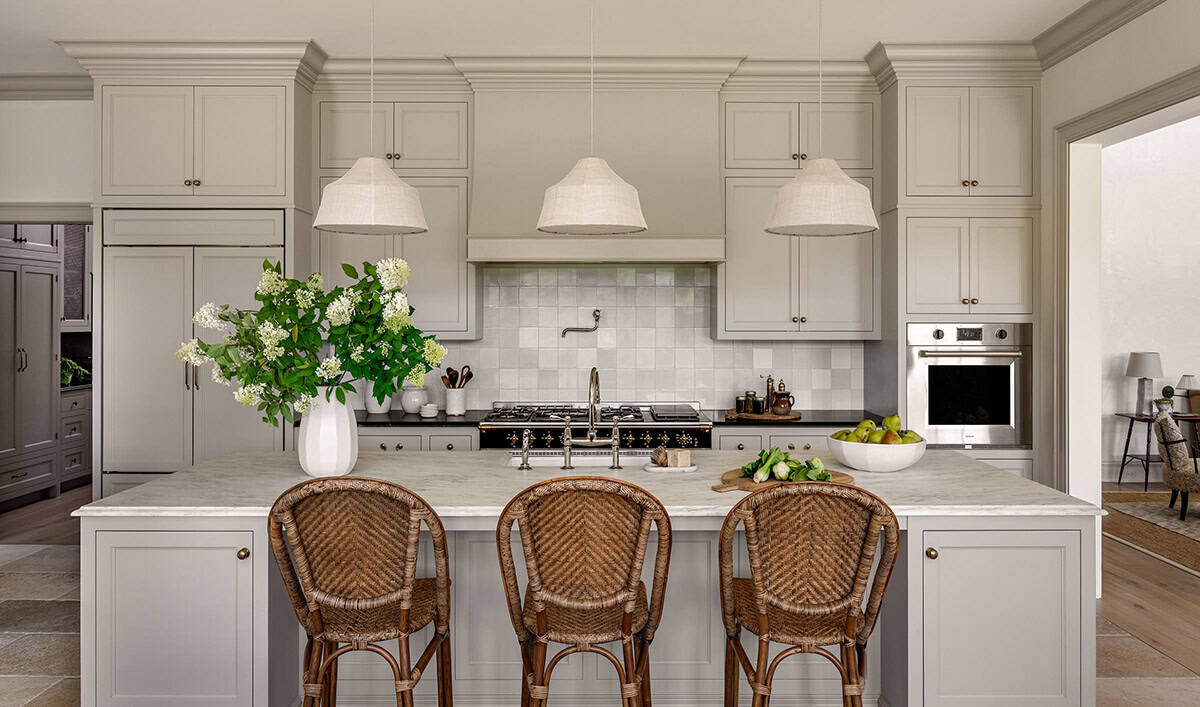 modern farmhouse style kitchen with large pendant lights