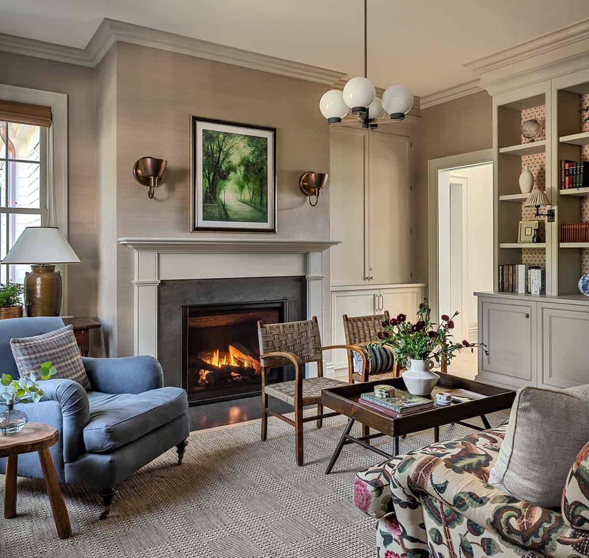 modern farmhouse style family room with a fireplace