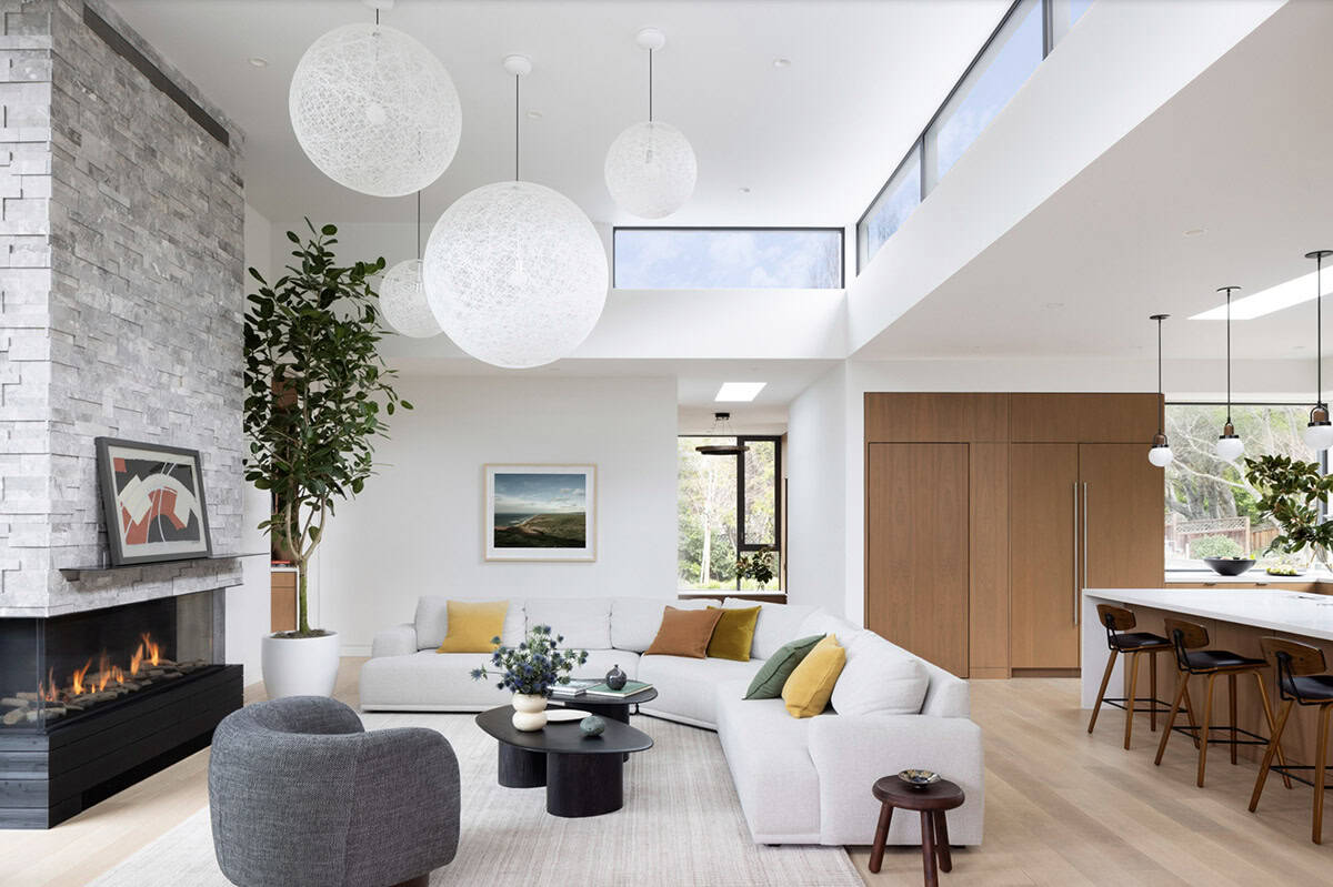 contemporary living room with large pendant lights