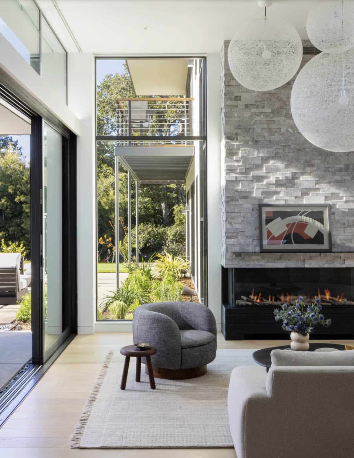 contemporary living room with a fireplace